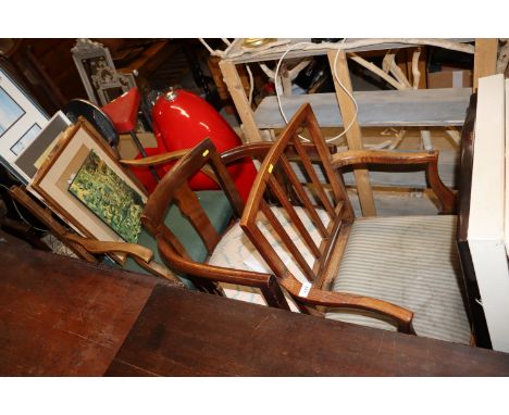 An antique elm elbow chair; a tub shaped desk chair and a ladder back elbow chair 