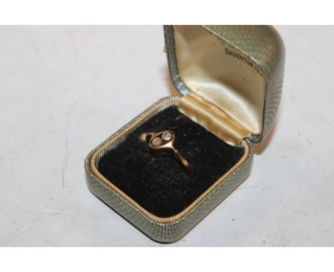 A yellow metal marked 585 and diamond set ring AF, ring size I/J approx. 1.5gms 