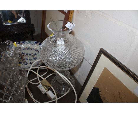 A cut glass table lamp and shade