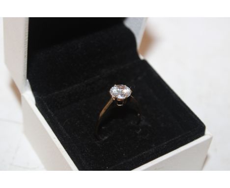 A 9ct gold Cubic Zirconia set solitaire ring, 1.5gms, ring size M