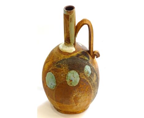 20thC School. Pottery flask with glazed decoration, C monogramme, 30cm high.