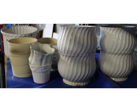 Various white ceramic planters
