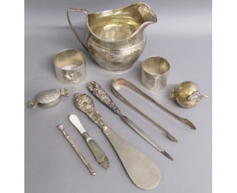 Collection of silver includes - London 1805 jug makers name rubbed 3.7ozt, napkin rings, Georgian sugar nips marks worn, ster