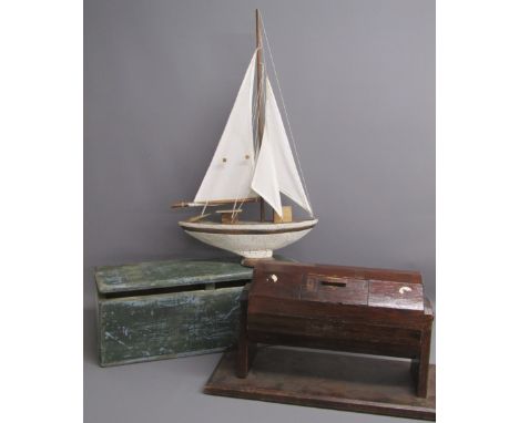 Wooden raffle roller, tool trunk and display boat