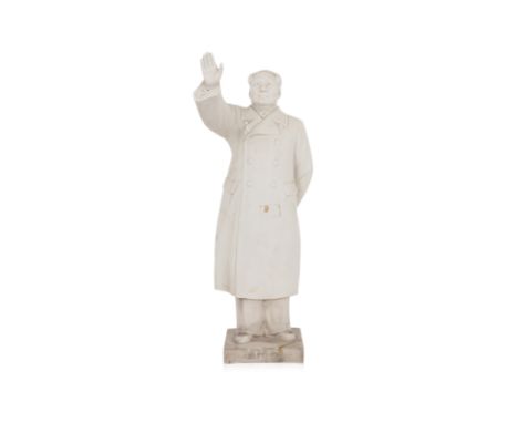 A CHINESE BISCUIT PORCELAIN FIGURE OF MAO ZEDONG
Modelled standing, in an overcoat, with his arm raised on square plinth base