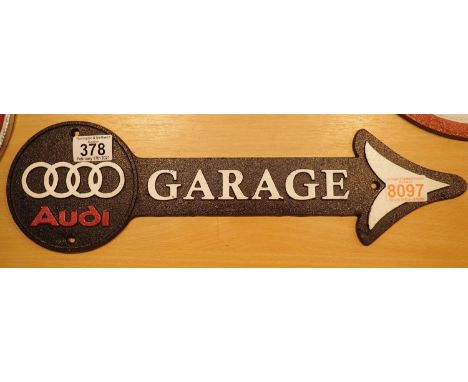 Cast iron Audi Direction sign, 44 x 13 cm. P&amp;P Group 1 (£14+VAT for the first lot and £1+VAT for subsequent lots) 
