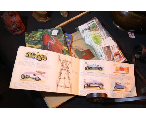 Selection of cigarette/tea cards including two complete albums of British Empire military uniforms. P&amp;P Group 1 (£14+VAT 