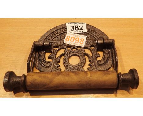 Cast iron toilet roll holder marked St. Pancras, 19 x 11 cm. P&amp;P Group 1 (£14+VAT for the first lot and £1+VAT for subseq