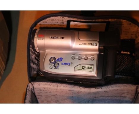 Cased Samsung VP-W87D 8mm camcorder with attachments, battery etc. P&amp;P Group 2 (£18+VAT for the first lot and £3+VAT for 