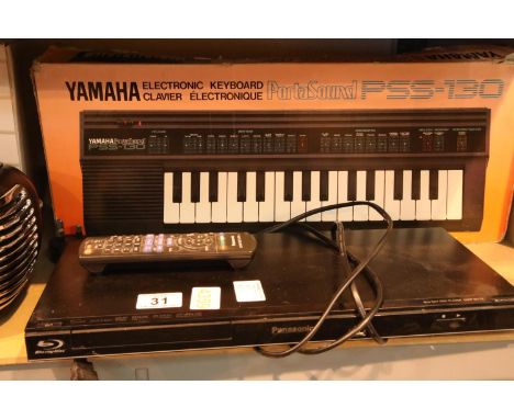 Yamaha PSS-130 electric keyboard and a Panasonic Blu-ray player with remote. P&P Group 2 (£18+VAT for the first lot and £3+VA