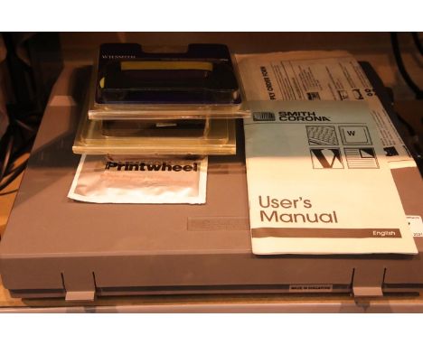 Smith Corona SL 470 electric typewriter and ribbon. P&P Group 3 (£25+VAT for the first lot and £5+VAT for subsequent lots)Con