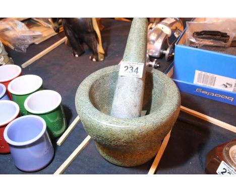 Heavy stone pestle and mortar. P&amp;P Group 2 (£18+VAT for the first lot and £3+VAT for subsequent lots) 