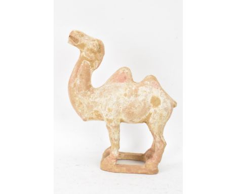 A Chinese terracotta model of a camel, possibly tang dynasty, 14.5cm high x 11cm wide 