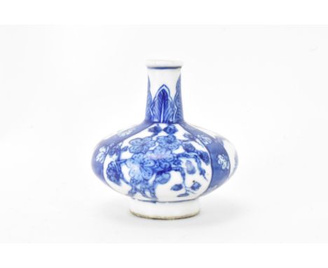 A Chinese miniature vase, Kangxi period (1660-1722) of squat baluster shape decorated in blue and white with bamboo trees and