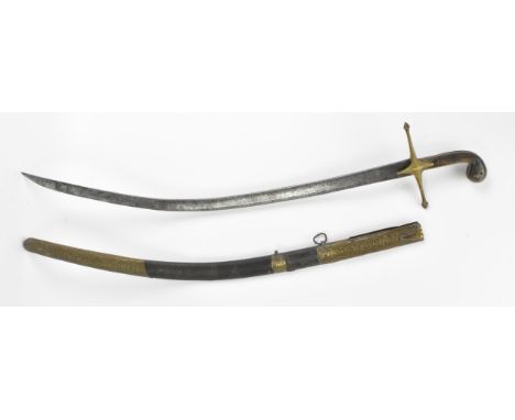 An Ottoman Empire shamshir sword, having a curved blade with gilt calligraphy, characteristic gilt brass hilt with two-piece 