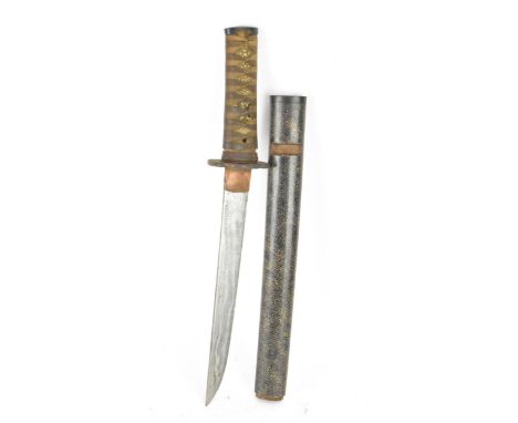 A Japanese wakizashi sword, steel blade, pierced tsuba, brown braid bound tsuka, shagreen handle, with a wray skin and lacque