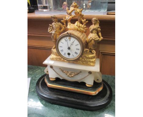 A late 19th century alabaster and gilt metal mantle clock under glass dome. Dome is 47cm in height.  