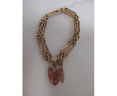 A 9ct gate link bracelet with heart shaped padlock clasp and safety chain, 11.4g  