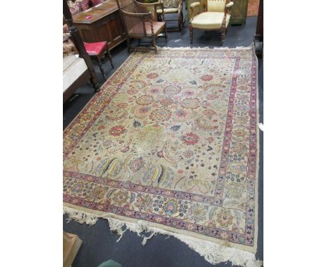 A Persian style pale ground carpet, approx. 350 x 210cm, and a smaller belouchi rug  