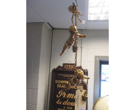 A pair of gilt cherub hanging lights & a gilt wall light  