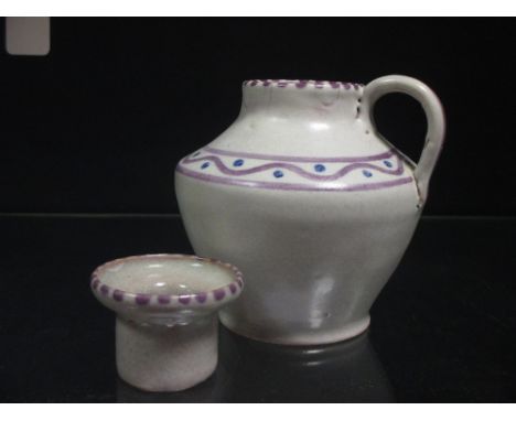 A Poole jug/candlestick by James Radley Young  