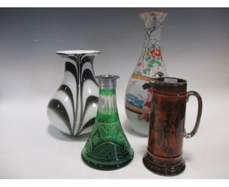 A black and white glass vase ovoid form together with a Japanese vase, a pottery stein and a green glass decanter with white 