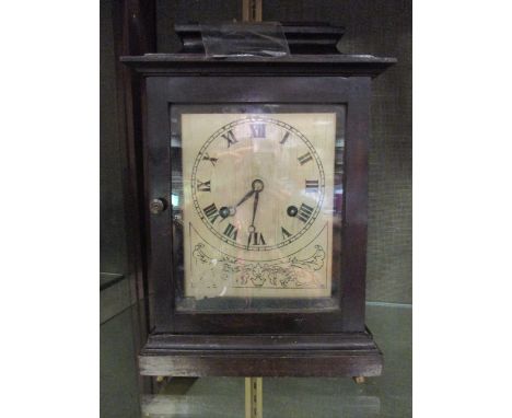 A British Gerome movement mantle clock with silvered dial and Roman numerals  