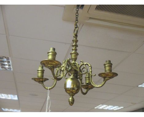 A brass four light chandelier  