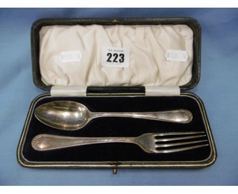 A boxed hallmarked silver spoon and fork set