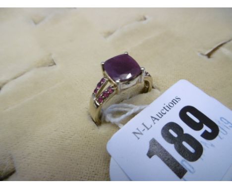 A 9ct gold ruby set ring size O