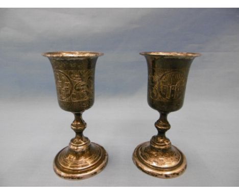 A pair of 19th century Russian 84 standard silver kiddush cups weight approximately 124 grams. 