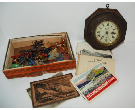A tray lot including oak cased wall clock, various postcards, toy soldiers etc&nbsp; Condition Report:Available upon request