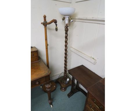 An early 20th century mahogany barley twist standard lamp, another standard lamp and a mahogany nest of three tables (3) Cond
