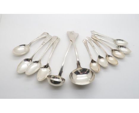 A quantity of silver flatware including a silver sauce ladle in the fiddle pattern by David McDonald, Glasgow 1833, another b