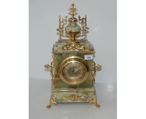 An onyx and gilt mantle clock Condition Report:Available upon request