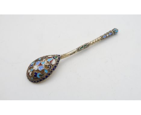 A Russian silver gilt and enamel spoon, with wrythen stem and enamel finial, 84 standard Kokoshnik mark, makers mark unclear,