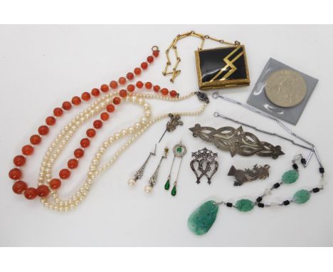 A silver luckenbooth by Ward Brothers, a white metal example, an Ola Gorie thistle brooch, and a collection of good vintage t