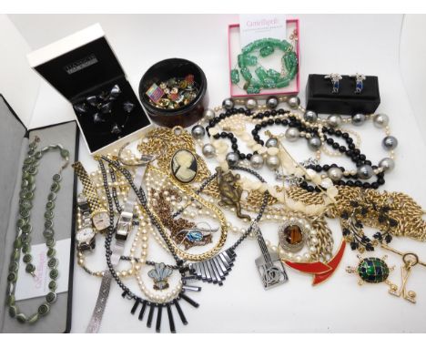 A collection of vintage costume to include watches and a tortoise brooch Condition Report:Not available for this lot.