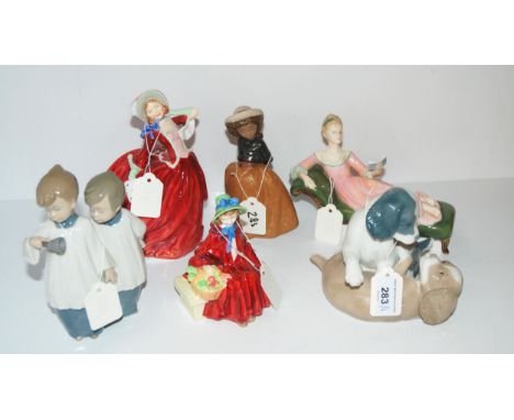 Three Royal Doulton figures including Linda, Repose and Autumn Breezes and three Nao figures Condition Report:All in good con