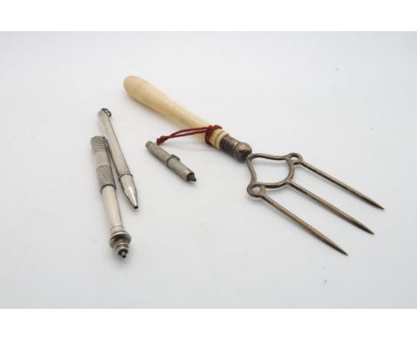 A silver propelling pencil by&nbsp;William Vale &amp; Sons, Birmingham 1905, two further white metal examples, and a bone han