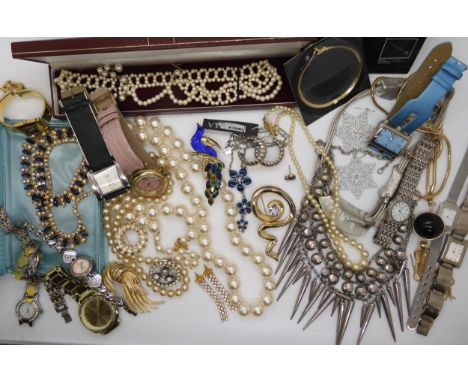 A Joan Rivers pearl necklace, a collection of statement necklaces and earrings, a peacock hair slide, fashion watches and oth