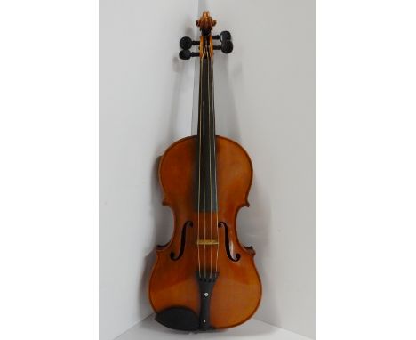 A Wolff Bros violin, two piece back 36.6cm, with Wolf Bros Violin Manufacturers Class 15 No. 3662 made abroad label to the in