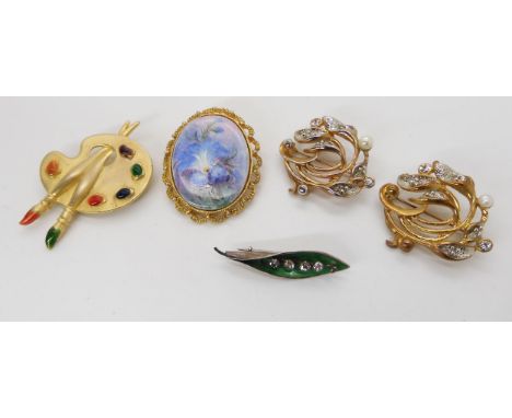 A silver and green enamel lily of the valley brooch with Birmingham hallmarks for 1920, and other items Condition Report:Not 