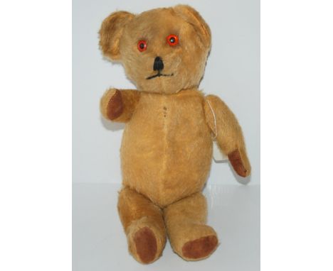 A vintage centre-seem Teddy bear, with growler, 40cm high Condition Report:Available upon request