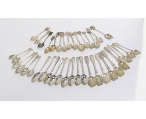 A collection of silver flatware including silver and enamel souvenir spoons, six silver coffee spoons by Chawner &amp; co, Lo