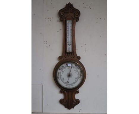 A Victorian oak aneroid barometer/thermometer Condition Report:Available upon request