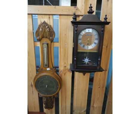 A 20th century mahogany cased wall clock and an oak barometer/thermometer converted to a clock (2) Condition Report:Available