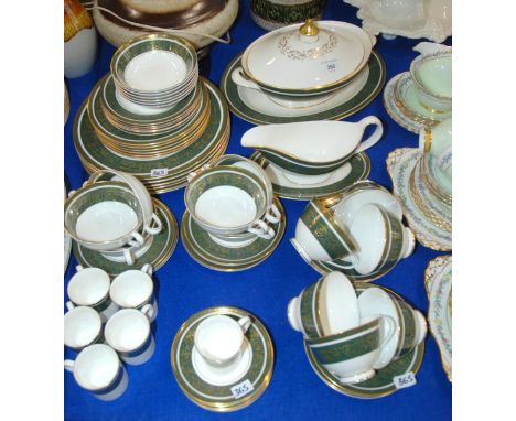 A Royal Doulton Vanborough pattern dinner service comprising six coffee cans and saucers, teacups and saucers, soup coupes an