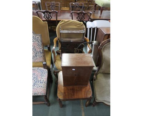 A 20th century mahogany lamp table, countertop cabinet, upholstered mahogany framed armchair, wall hanging cabinet, adjustabl