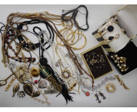 A collection of vintage and modern costume jewellery to include items by Avon and Whistles Condition Report:Not available for